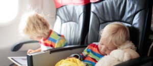 Child,In,Airplane.,Kid,In,Air,Plane,Sitting,In,Window